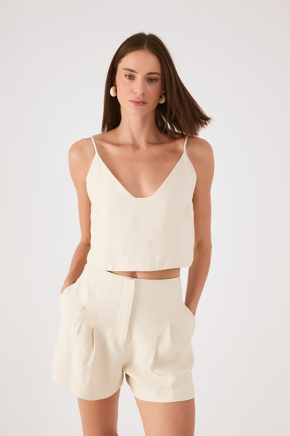 Off-White Sleeveless Asymmetric Crop Top