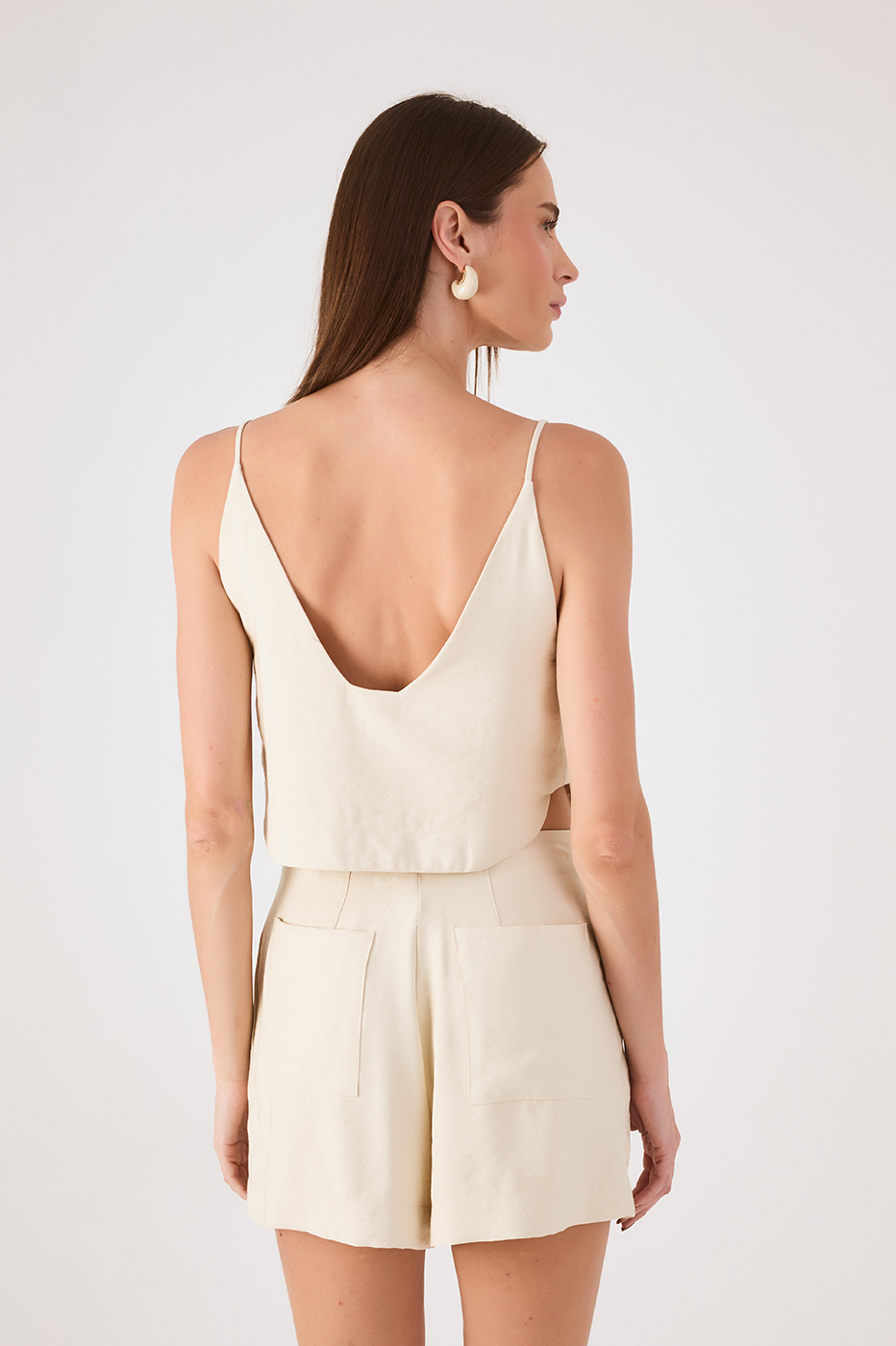 Off-White Sleeveless Asymmetric Crop Top
