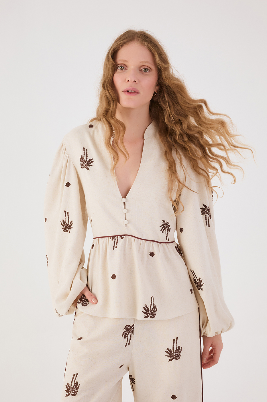Off-White Sol Rio Embroidered V Neck Puff Sleeve Peplum Blouse