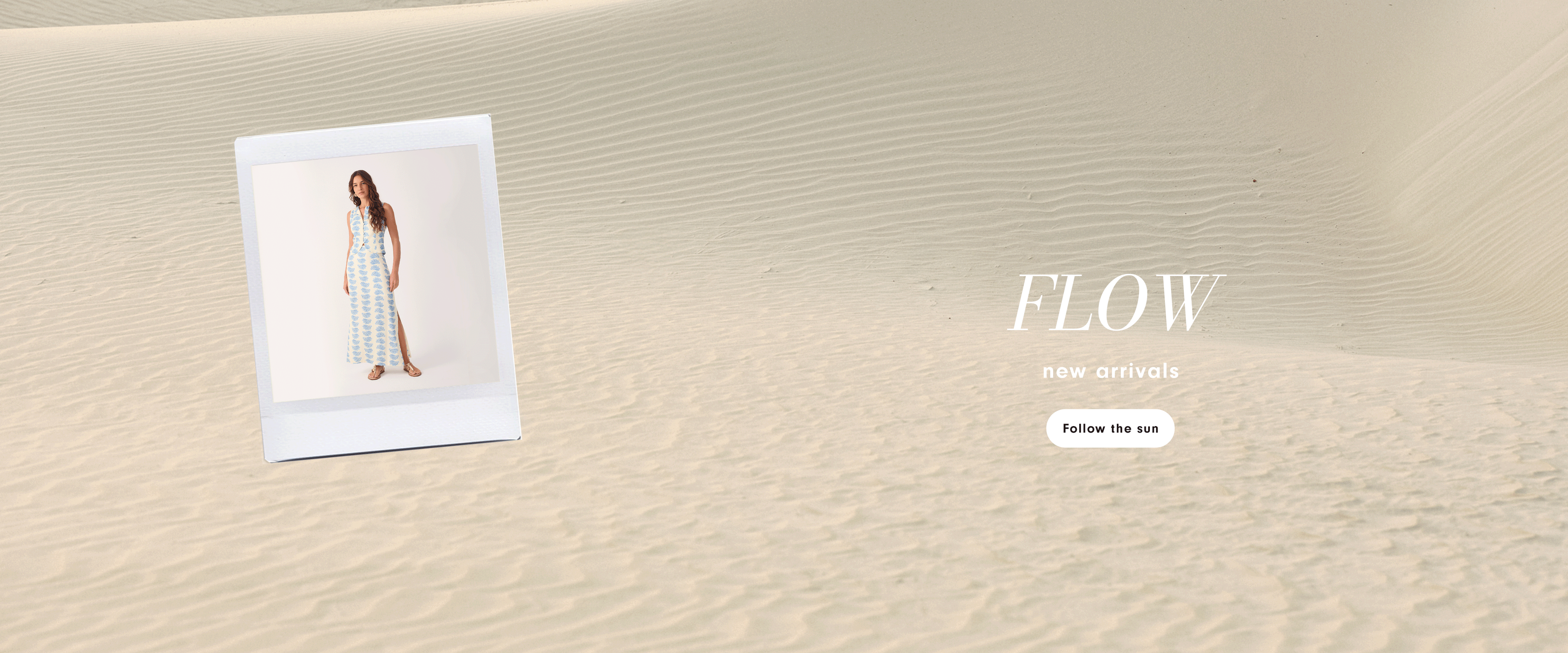 Desktop banner with sand desert background featuring a polaroid photo of a woman in a dress with the text "FLOW new arrivals" and "follow the sun" button