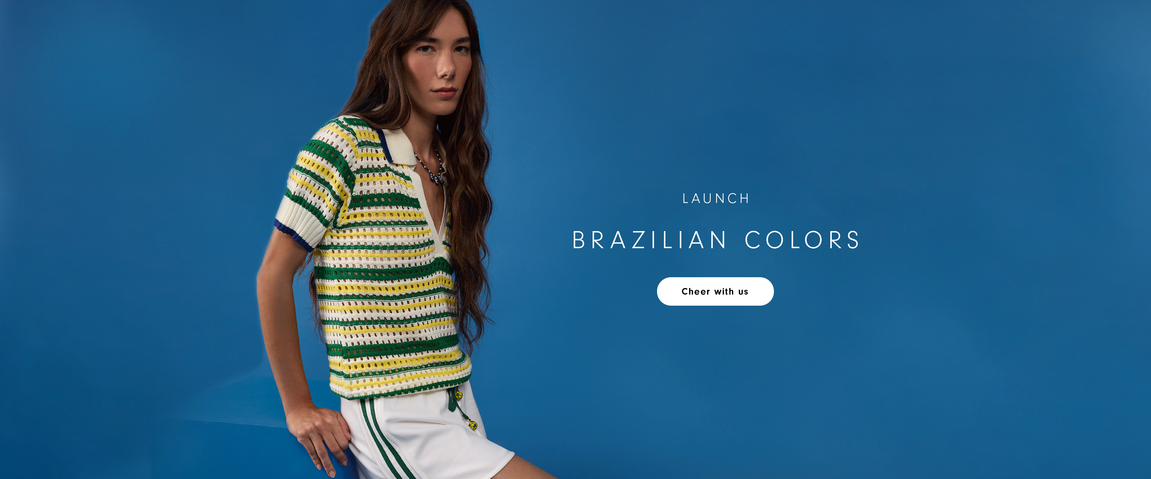Animated desktop banner showing a woman modeling Brazilian Colors collection outfits in green, yellow, and white knitwear against a blue background, with text "Launch Brazilian Colors" and a "Cheer with us" button.