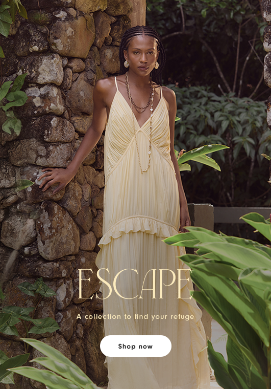 Escape collection mobile banner featuring a woman in a flowing yellow dress against a stone wall with tropical plants