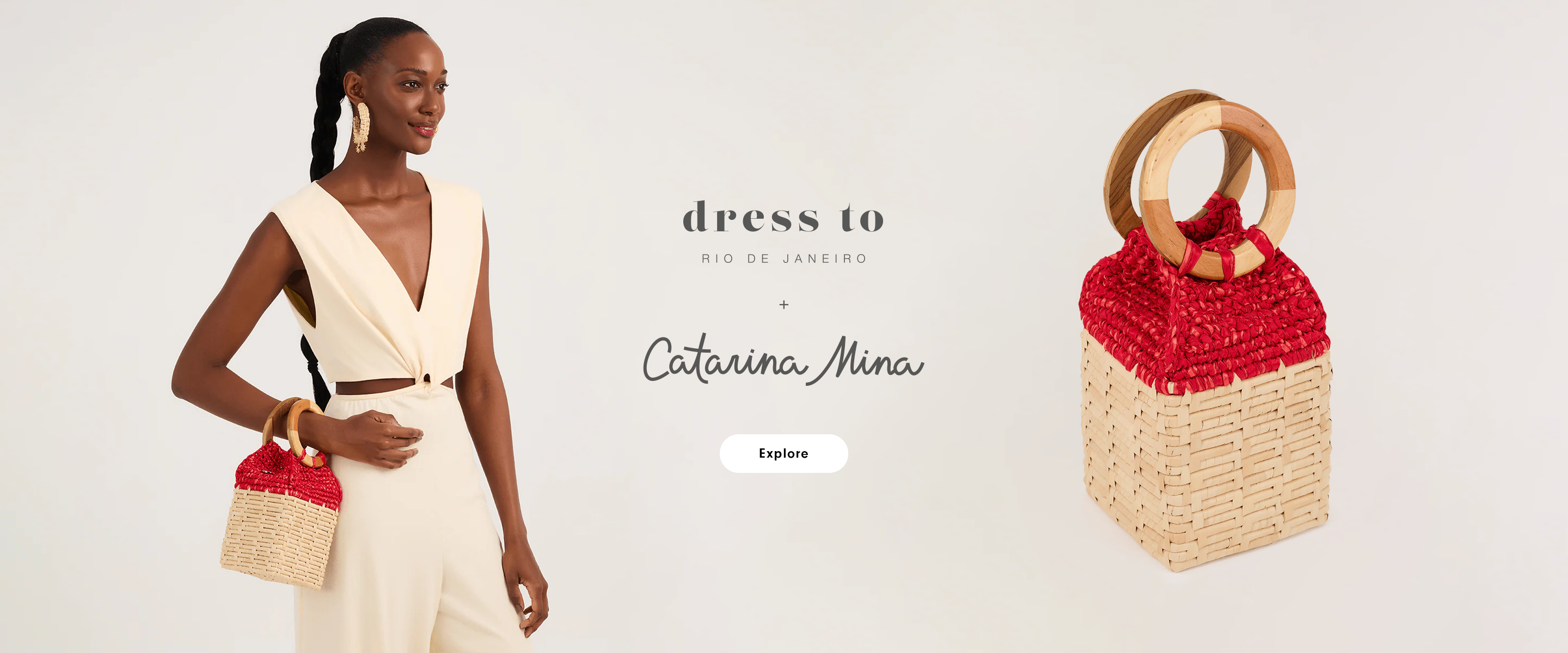 Dress To x Catarina Mina secondary desktop banner featuring a woman in a cream jumpsuit with a red and beige woven handbag