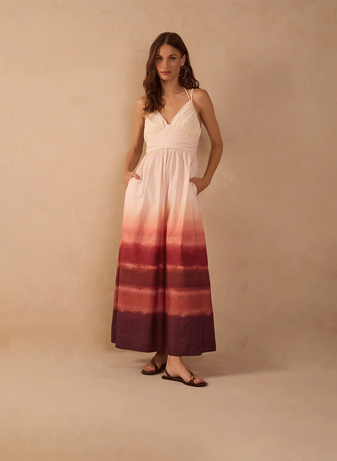 Prints category banner: model against a beige backdrop wearing a strappy maxi dress with a burgundy tie-dye ombré print