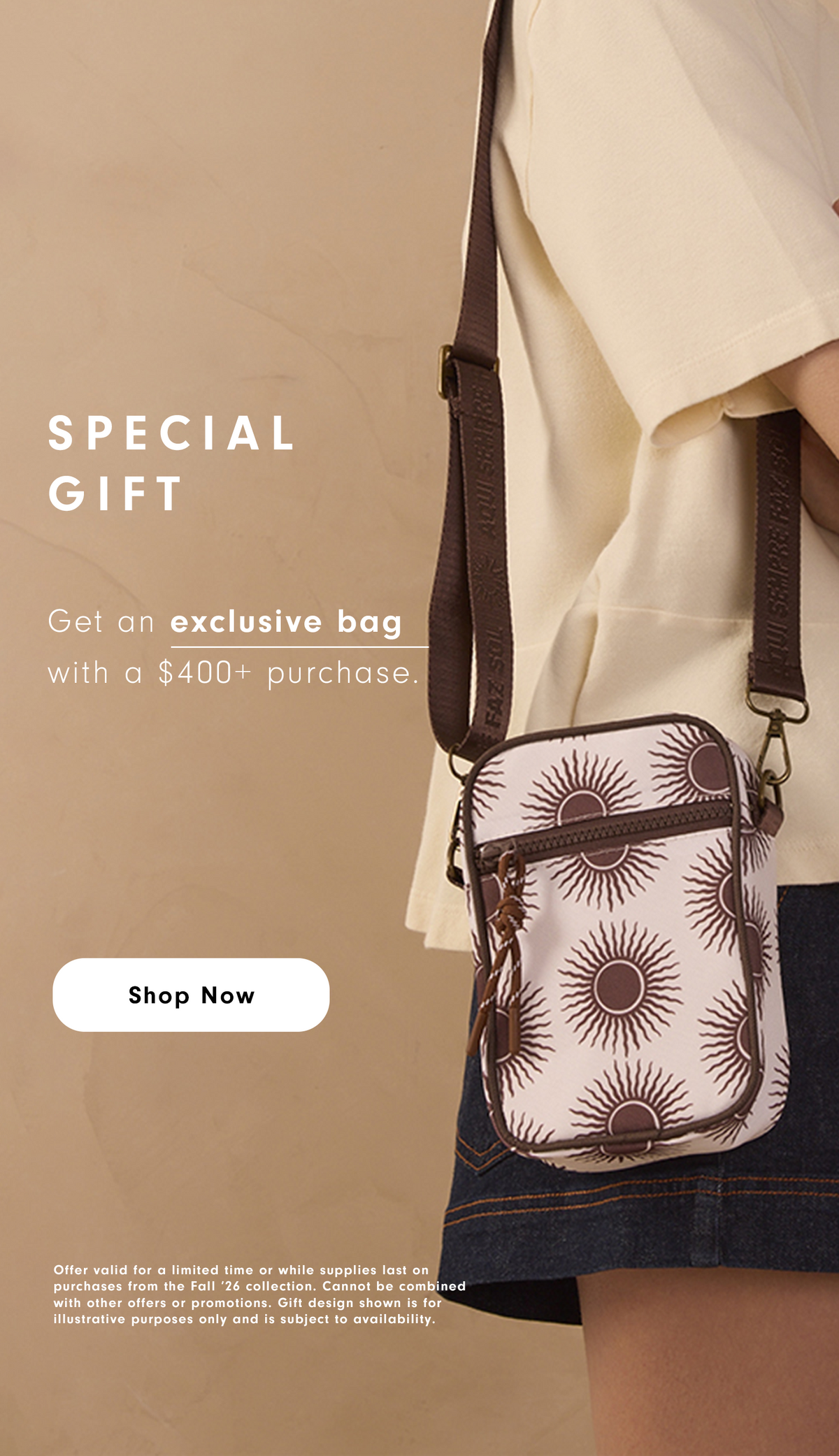 Special gift mobile banner: woman in a cream shirt and denim skirt carrying a sun-print crossbody bag, offering an exclusive bag with purchases over $400, with a "Shop Now" button