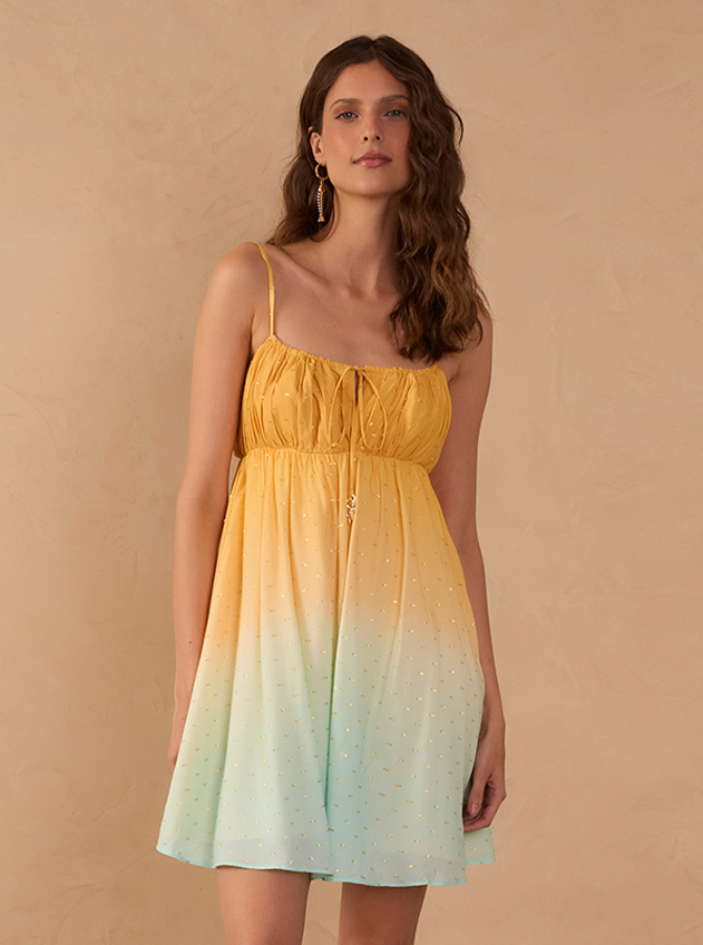 Model wearing yellow to mint green ombre mini dress with sequins - size M fit reference