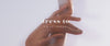 Home page desktop banner video: close-up of a woman's hands with the Dress To Rio de Janeiro logo on a light background