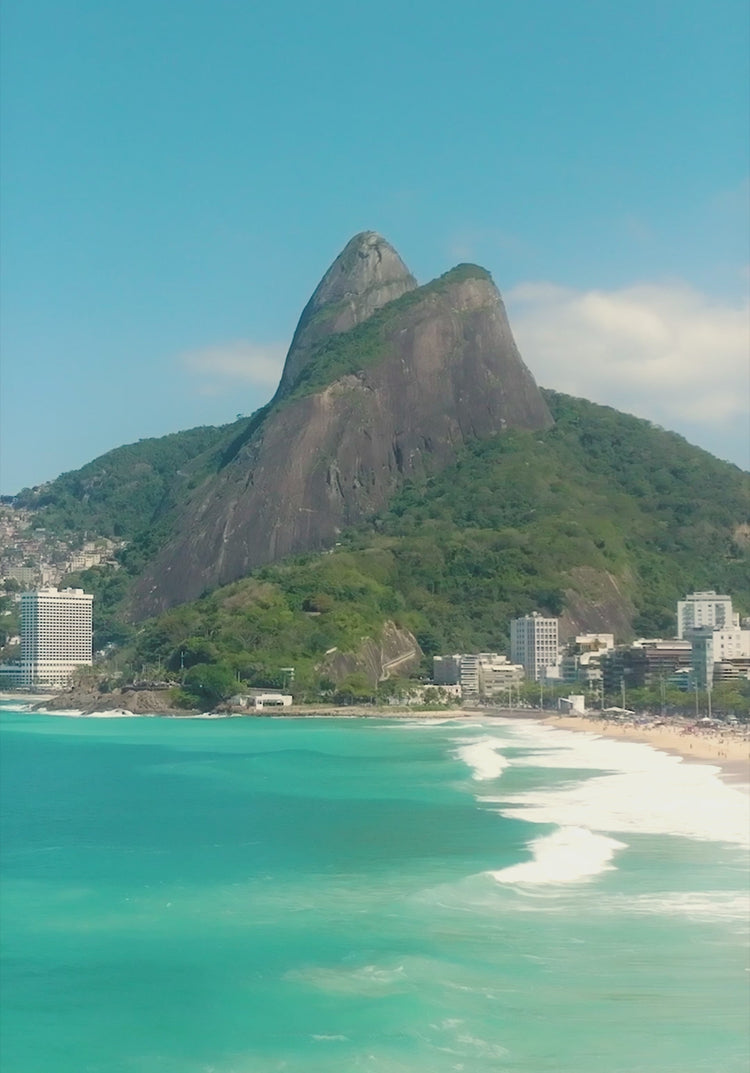 Summer campaign video with close-ups of a woman in the Brazilian sun wearing gold hoop earrings